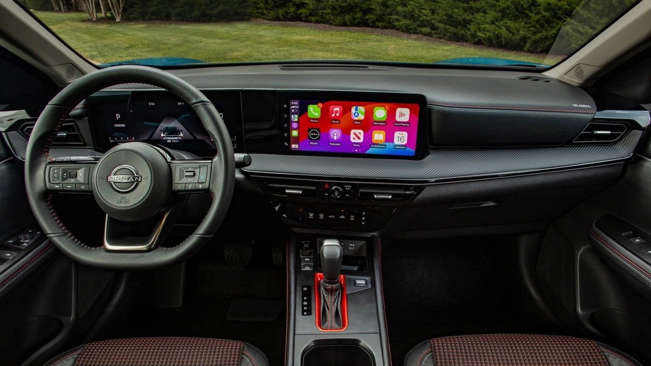 vue de l'habitacle et du tableau de bord d'un Nissan Kicks 2026